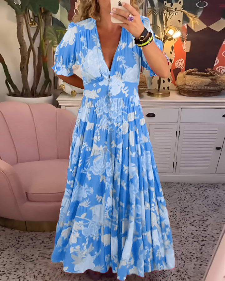 Carina | V-hals jurk met bloemenprint en zakken