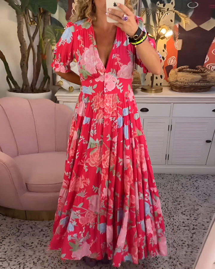 Carina | V-hals jurk met bloemenprint en zakken